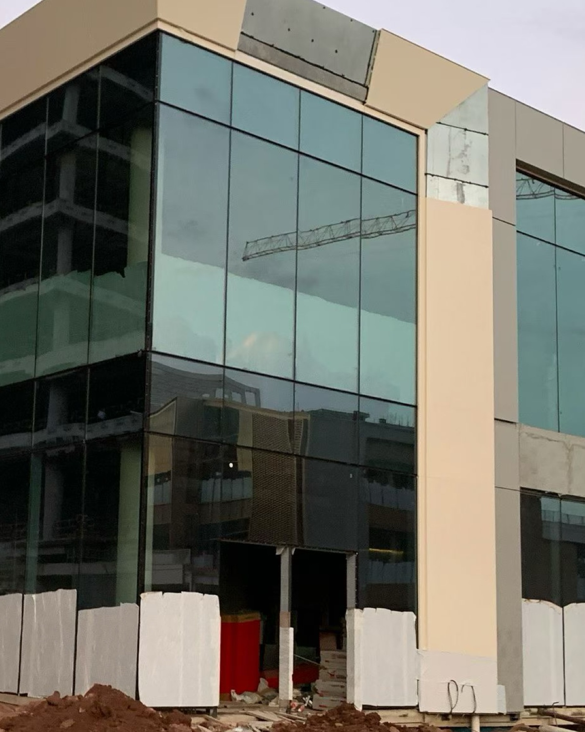 Installation-stage panel-to-glass corner showing why interface scope and project stage belong in the RFQ.