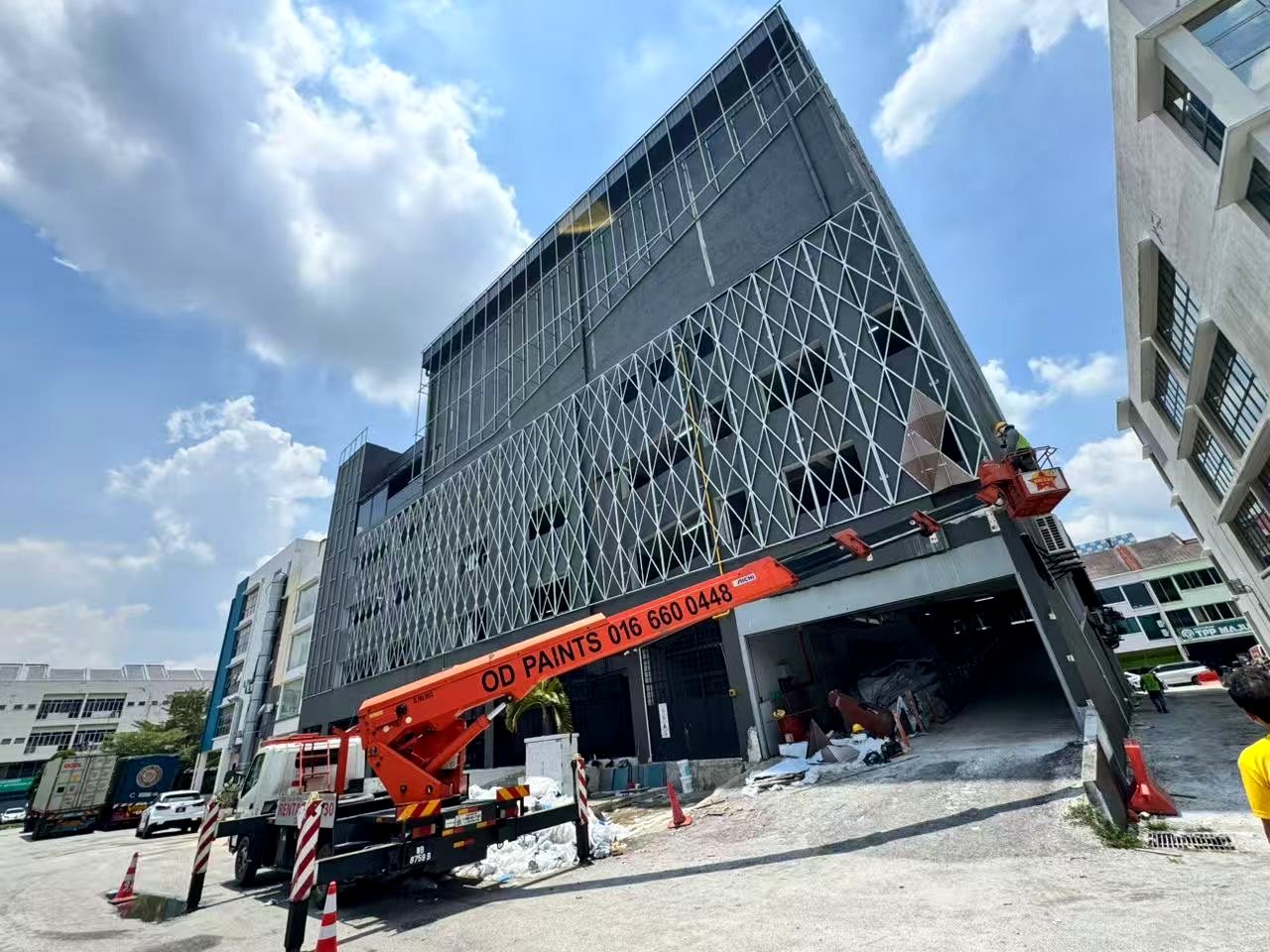 construction stage aluminum facade project with decorative cladding installation