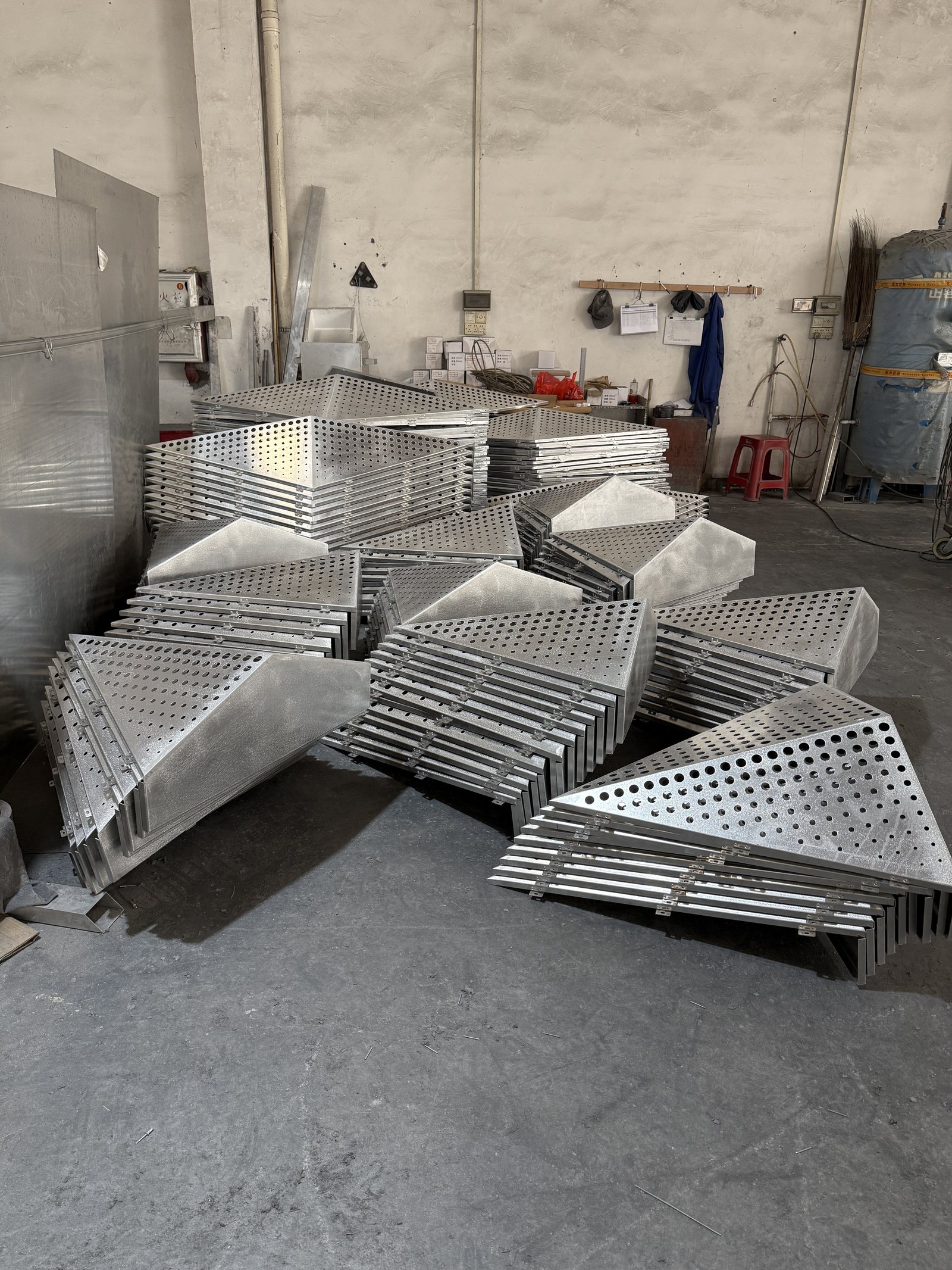 Punchuk factory production of custom perforated solid aluminum panels for Malaysia hotel facade