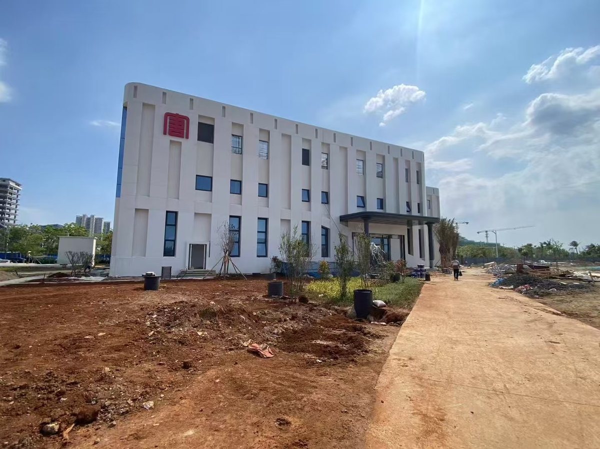Hainan new energy office building facade with white 3.0mm PVDF solid aluminum panels by Punchuk