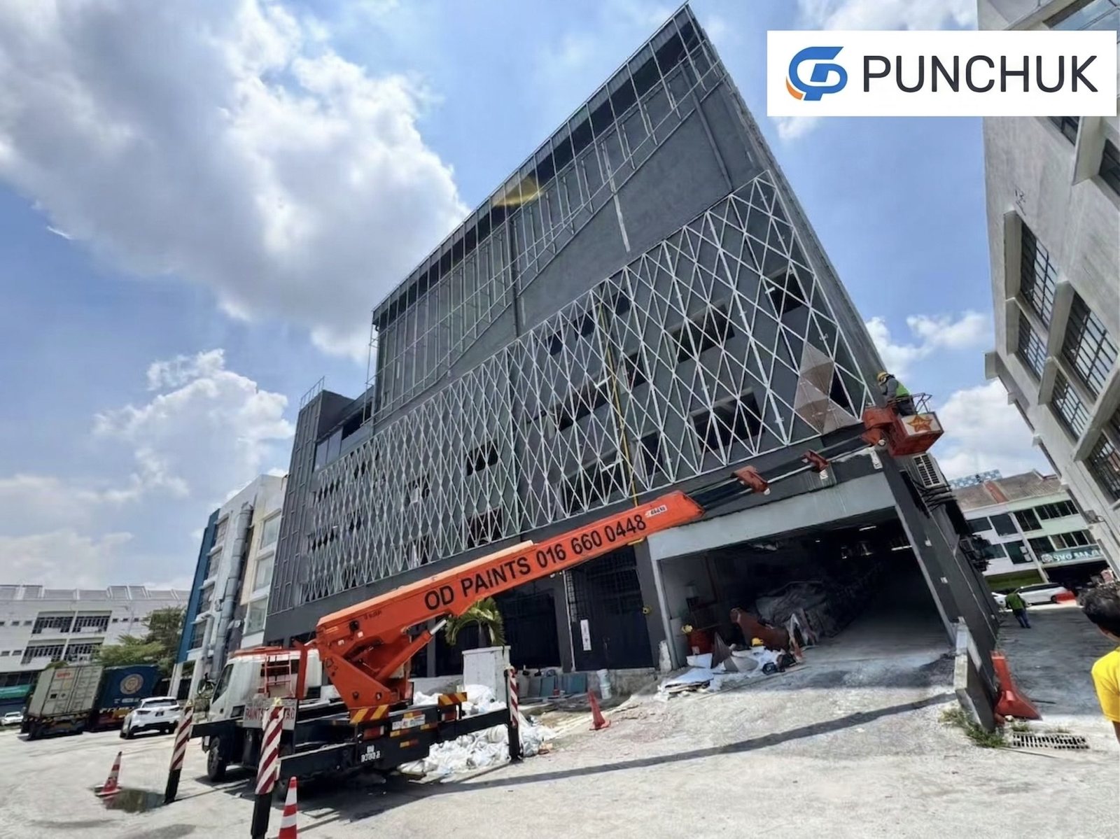 Perforated aluminum screen installation on Malaysia hotel curtain wall facade by Punchuk