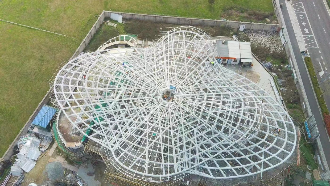 Curved aluminum canopy cladding for service station project