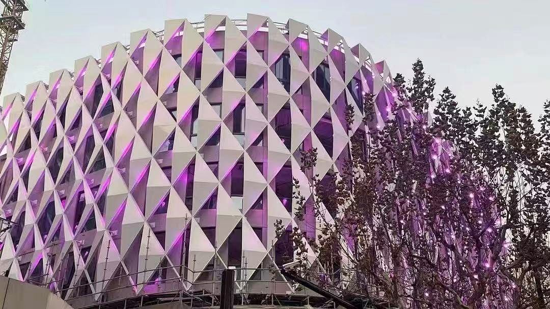 perforated aluminum facade screen project with decorative aluminum cladding