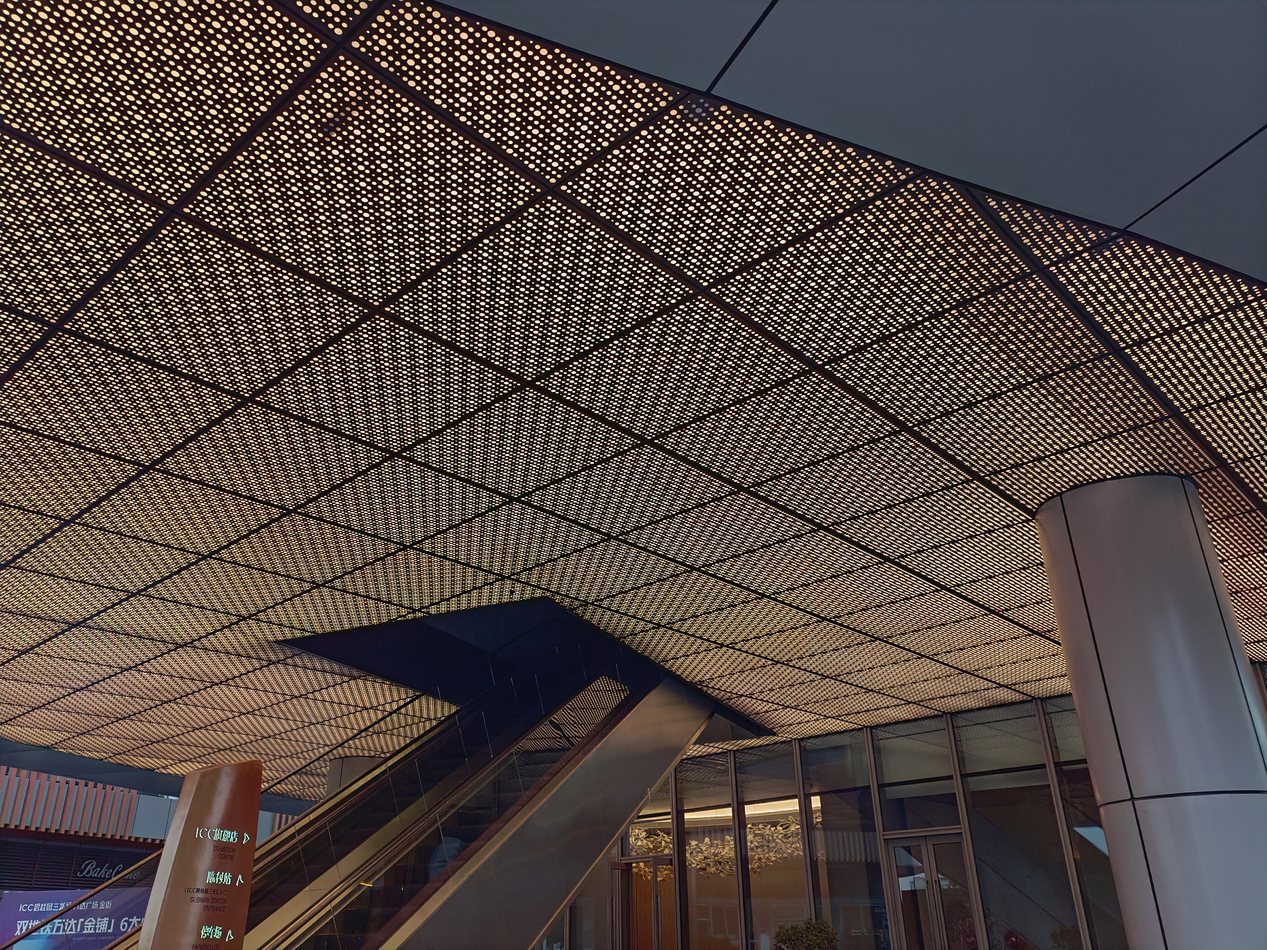 Commercial mall aluminum ceiling and canopy panels with warm metallic finish