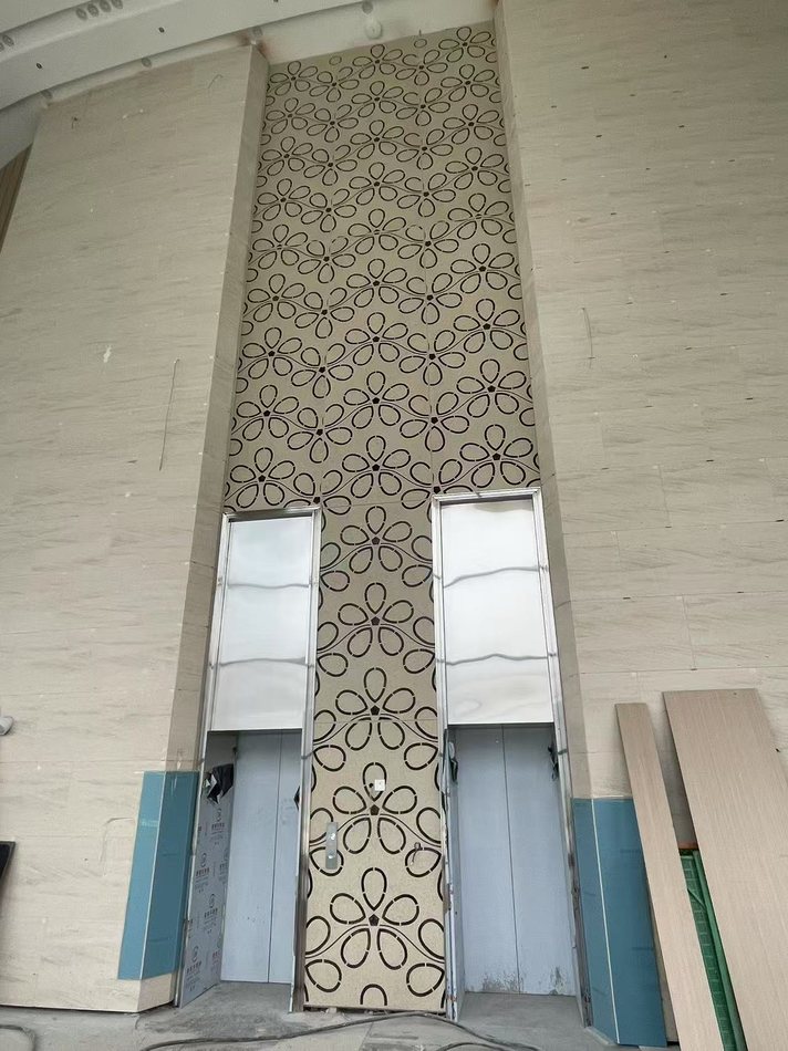 Patterned aluminum wall panel for cultural activity center interior